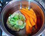 Foto del paso 7 de la receta: Arroz en paellera de mini verduras orgánicas y azafrán