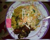 A picture of step 6 of Jollof rice with coleslaw.