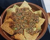 A picture of step 2 of Nachos with Meat and Peppers.
