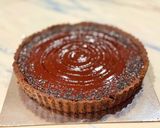 A picture of step 13 of Miso black sesame baked chocolate tart.