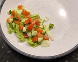 A picture of step 2 of Chipotle Chicken with Chilli Jam salad bed.