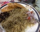 A picture of step 12 of Channy ki daal waly rice with aaloo pakora.