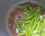 A picture of step 1 of Chicken pulao.