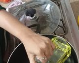 A picture of step 1 of Butt palak recipe.