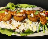 A picture of step 11 of Aloo Tikki Makhani Rice Platter.