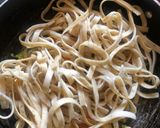 A picture of step 1 of Linguine white sauce pasta.