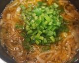 A picture of step 7 of Spanish-Style Meatballs in Sauce.