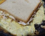 A picture of step 6 of Egg cheesy sandwich.