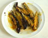 A picture of step 2 of Niramish Doi Begun (Brinjal masala curry).