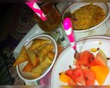 Indomie, spring rolls and samosa, fruit and special drinkmatakin girki2 hoto