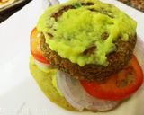 A picture of step 9 of Semolina Avocado cake  veg burger with dal tikki  and stick.