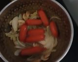 A picture of step 5 of Tomato Sausage Soup.