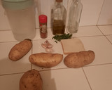 Foto del paso 1 de la receta: Patatas fritas aliñadas al ajillo