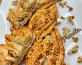 Foto del paso 7 de la receta: Clásica trenza de hojaldre con crema de avellanas, nueces & almendra