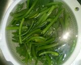 Hình bước làm 2 của món Đọt Bí Xào Tỏi