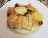 Foto del paso 11 de la receta: Bacalao en salsa de cebolla y uvas pasa