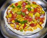 A picture of step 10 of Cheese burst pizza kadai baked.