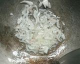 A picture of step 4 of Pad Thai Shrimp Wrapped in Egg with Tamarind Sauce.