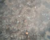 Foto del paso 7 de la receta Arroz negro a la paella con calamares de potera, gambones y alioli de dos ajos