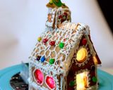 A picture of step 4 of “Eggless Gingerbread House” with icing.