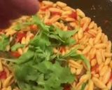Foto del passaggio 7 della ricetta Cavatelli e rucola al pomodoro