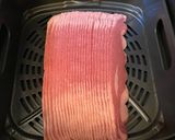 A picture of step 2 of Air fried bacon.