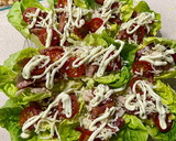 Foto del paso 5 de la receta: Wraps o tacos de hojas de cogollos con ensalada César