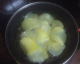Foto del paso 2 de la receta: Papas onduladas fritas al ajillo con ketchup