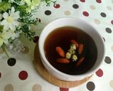 A picture of step 3 of Healthy Tea Drink ~ Chrysanthemum, Goji Berry, and Winter Melon Tea.
