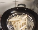 A picture of step 4 of Peri peri French fries.