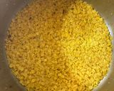 A picture of step 1 of Masoor Dal Bharta with North Indian Style Chapati and Chatpata Mango Pickle.