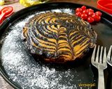 A picture of step 9 of Zebra Cake.