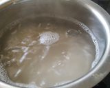 A picture of step 1 of Lemon Rice With Masala curd.