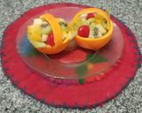 Foto del paso 4 de la receta: Ensalada de frutas en cazuelitas de naranja