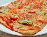 Foto del paso 12 de la receta: Pizza de alcachofa y langostinos
