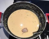 A picture of step 12 of Rabri Malpua.