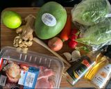 A picture of step 1 of Honey, soy and lemon grass Pork with Mango in Lettuce cup.