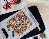 A picture of step 7 of Thin Crust Pizza.