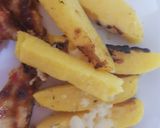 A picture of step 4 of Polenta Chips with mozarella cheese & Italian herbs.