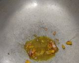 A picture of step 4 of Tangy Bitter gourd(Karela) stuffed with mango.