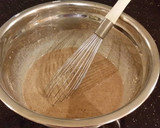 A picture of step 11 of Chocolate Layer Torte with Coconut Cream Filling and Frosting.