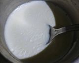 A picture of step 2 of Vanilla Panna cotta in Strawberry Sauce.