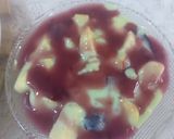 A picture of step 4 of Pista fruit custard orange jelly with black currant sauce.