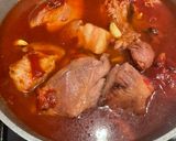 A picture of step 5 of Braised Pork with Tomato Sauce.