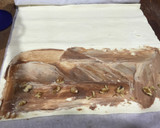 Foto del paso 3 de la receta: Ensaimada de nocilla y nueces