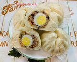 A picture of step 7 of Steamed Pork Buns with Quail Eggs (Bánh bao nhân thịt trứng cút).