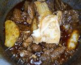 A picture of step 10 of Aloo Gosht.