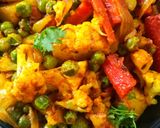 A picture of step 5 of Cauliflower, Potato, Peas, and Carrot Curry.
