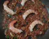 Foto del paso 5 de la receta: Lubina con gambas y almejas en salsa