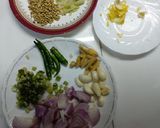A picture of step 1 of Prawns thai green curry with boiled rice.